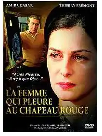 Watch and Download La Femme qui pleure au chapeau rouge 1