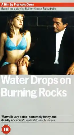 Watch and Download Water Drops on Burning Rocks 11